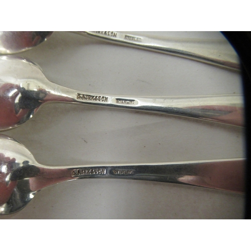 237 - A set of twelve Sterling silver teaspoons