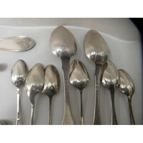 241 - Silver, white metal and plated cutlery and flatware: to include a Sterling silver slice; teaspoons a... 