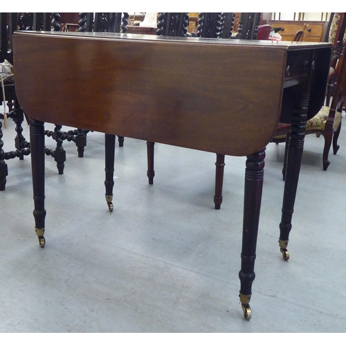 245 - A 19thC mahogany Pembroke table with round corners, an end drawer with facsimiles on the reverse, ra... 