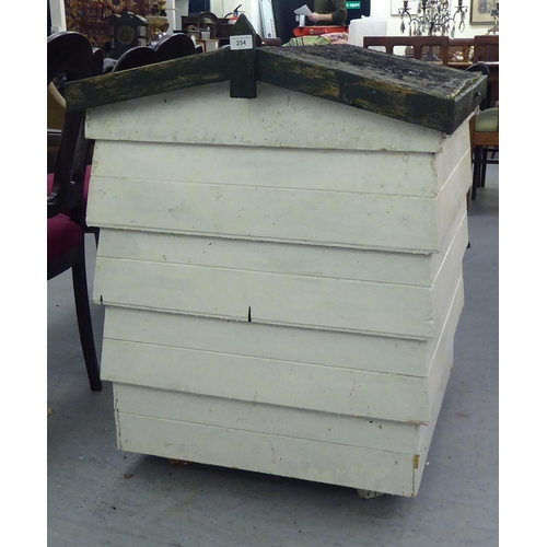 254 - A white painted wooden beehive  34