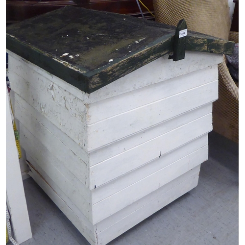 254 - A white painted wooden beehive  34