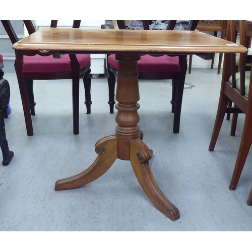 26 - A 19thC mahogany pedestal table, over a ring turned column, raised on a splayed tripod base  27