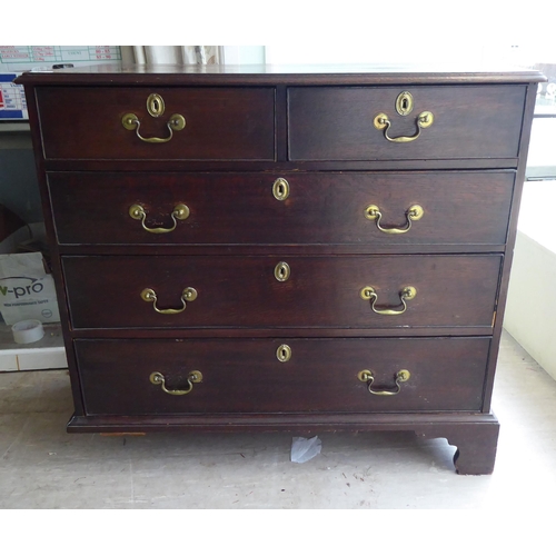 27 - A 19thC oak dressing chest, comprising two short/three long drawers with brass bail handles, raised ... 