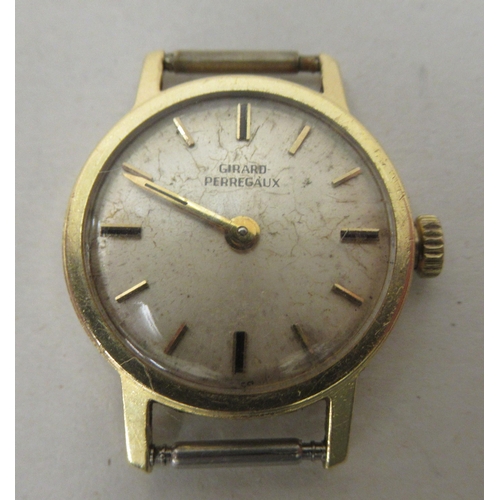 279 - A lady's Gerard Perregaux 9ct gold cased  wristwatch, faced by a baton dial