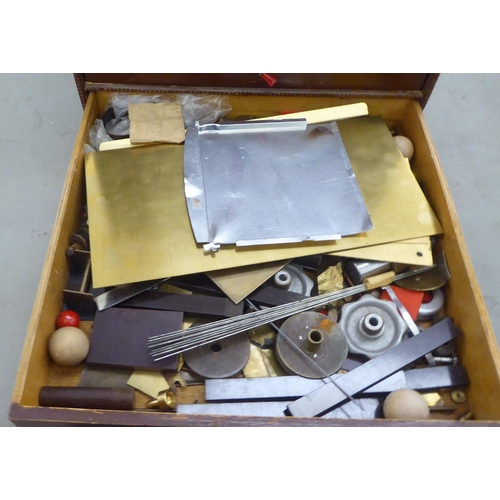 283 - Watchmaker's tools and accessories, contained in an early 20thC brown painted, five drawer chest&nbs... 