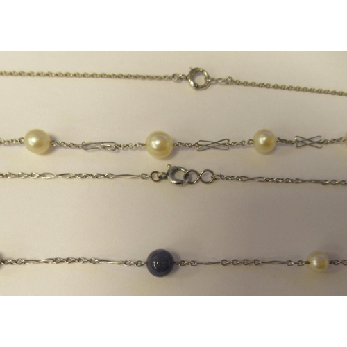 30 - Two fine white metal neckchains, one set with cultured pearls, the other cultured pearls and lapis l... 