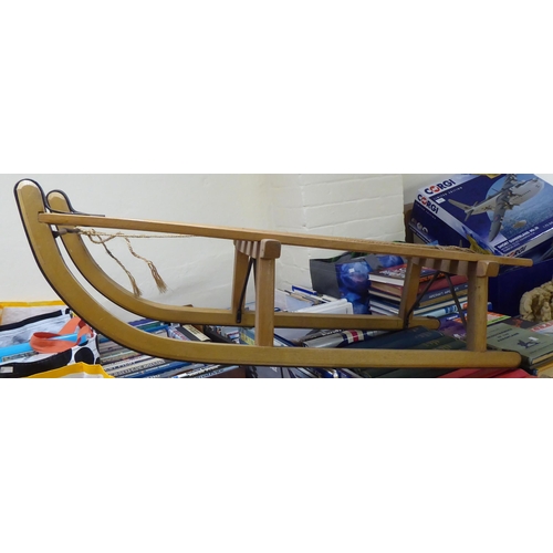 313 - A Stuart Surridge, George Clarke, unpainted, beech framed toboggan  38