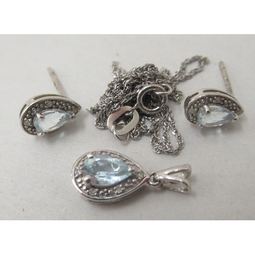 315 - A pair of 9ct gold aquamarine earrings; and a matching pendant