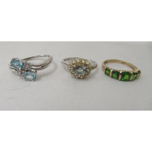 322 - Six gold, yellow metal and white metal rings, set with various coloured stones