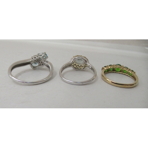 322 - Six gold, yellow metal and white metal rings, set with various coloured stones