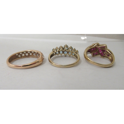 322 - Six gold, yellow metal and white metal rings, set with various coloured stones