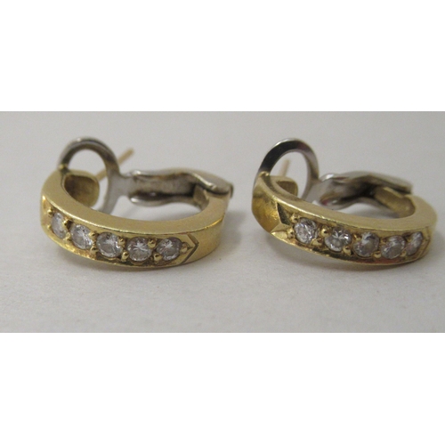 326 - A pair of 18ct gold diamond half hoop earrings