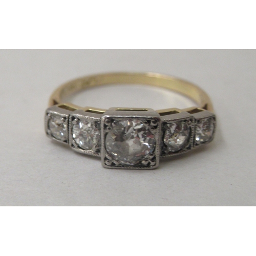 327 - An 18ct gold five stone diamond ring