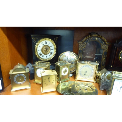 329 - Clocks, timepieces and cases only, decorated in a variety of taste  mixed sizes