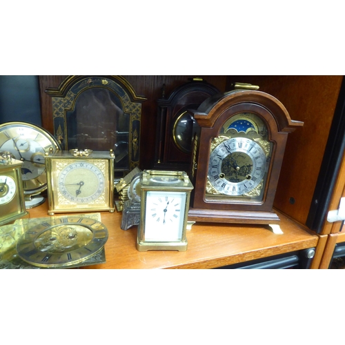 329 - Clocks, timepieces and cases only, decorated in a variety of taste  mixed sizes