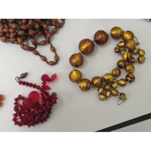 340 - Costume jewellery: to include coloured glass bead necklaces 