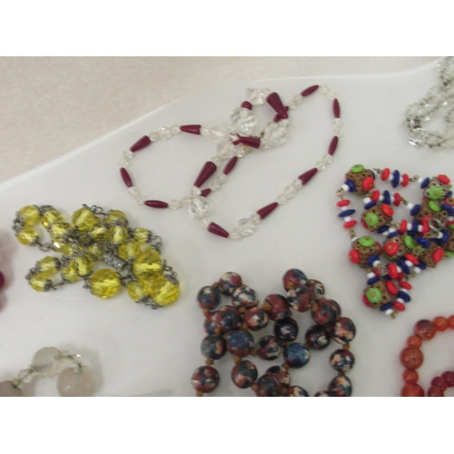 340 - Costume jewellery: to include coloured glass bead necklaces 