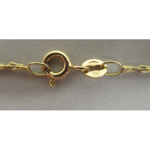 34 - An 18ct gold and diamond set heart shape pendant, on a fine neckchain and ring bolt clasp 