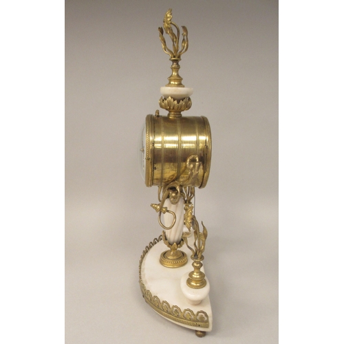 36 - A late 19thC Continental gilt metal and white alabaster pillar type mantel timepiece; the drum cased... 