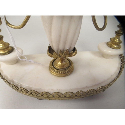 36 - A late 19thC Continental gilt metal and white alabaster pillar type mantel timepiece; the drum cased... 