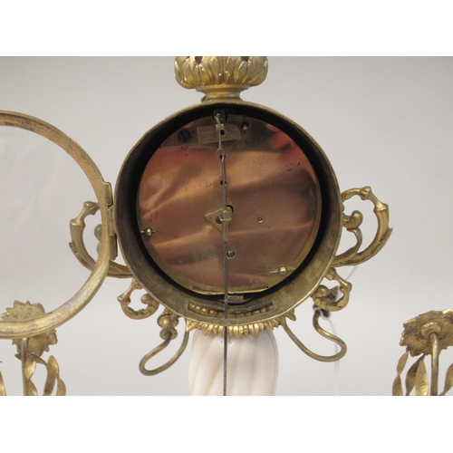 36 - A late 19thC Continental gilt metal and white alabaster pillar type mantel timepiece; the drum cased... 