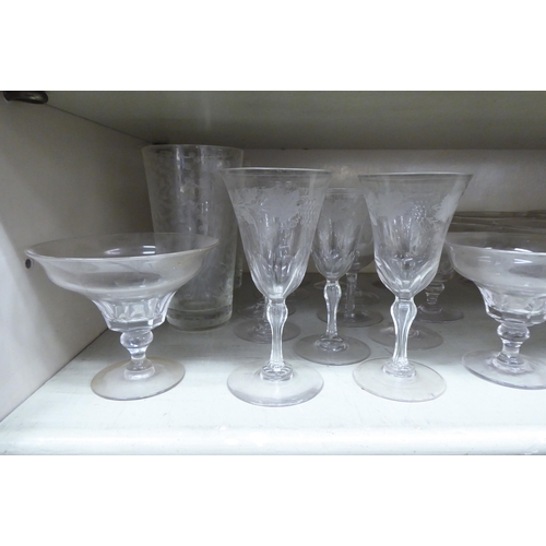 47 - Drinking glasses: to include a pair of tumblers with etched decoration 