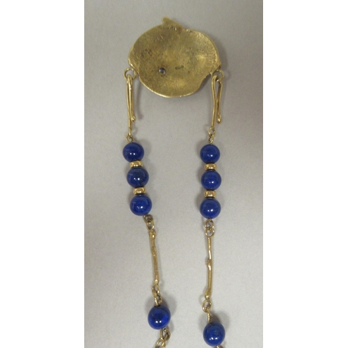 48 - An 18ct gold Scandinavian lapis lazuli and diamond set pendant, on a rod and ring link neckchain&nbs... 