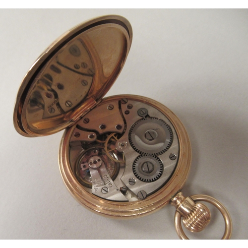 5 - A 9ct gold cased pocket watch, the keyless movement faced by a white enamel Arabic dial, incorporati... 