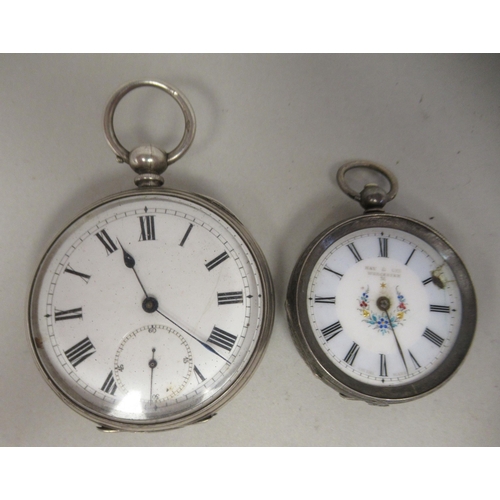 50 - A ladies engraved silver cased fob watch, faced by a Roman dial; and an engine turned silver cased p... 