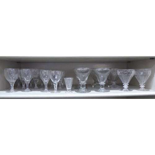 51 - Drinking glasses: to include a pair of pedestal rummers with etched decoration 