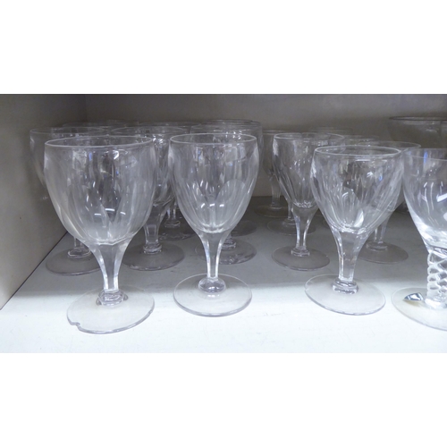 51 - Drinking glasses: to include a pair of pedestal rummers with etched decoration 