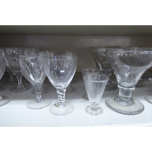 51 - Drinking glasses: to include a pair of pedestal rummers with etched decoration 