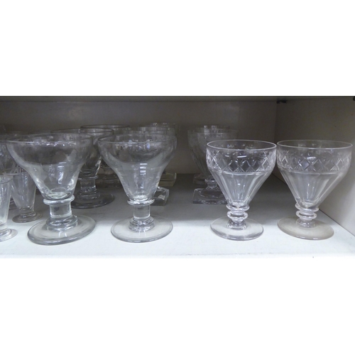 51 - Drinking glasses: to include a pair of pedestal rummers with etched decoration 