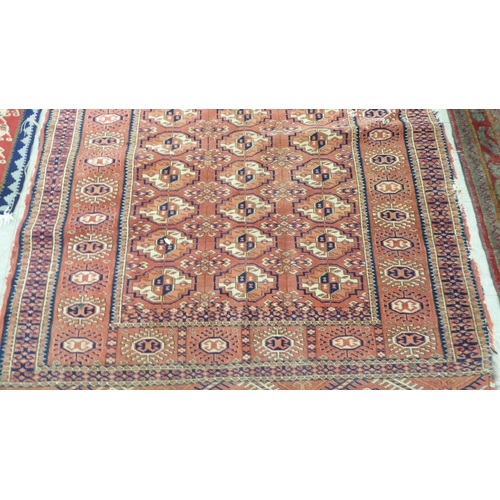 54 - Rugs: to include a Kilim examples with floral motifs, on a red and blue ground  37