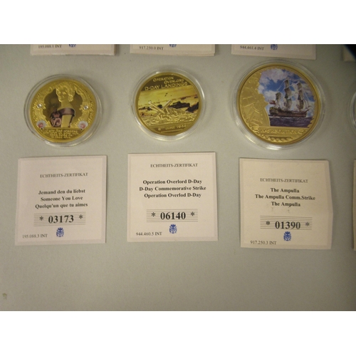 60 - A collection of thirteen various, modern commemorative medallions/coins  boxed