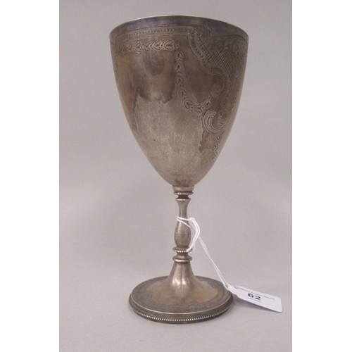 62 - A late Victorian silver ovoid shape pedestal trophy cup with scroll engraved and bead bordered ornam... 