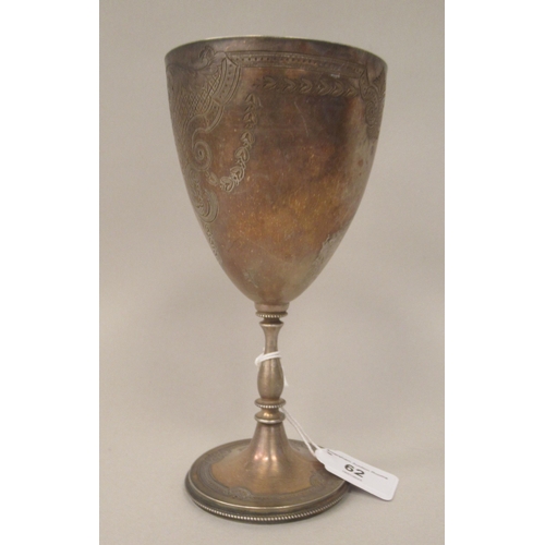 62 - A late Victorian silver ovoid shape pedestal trophy cup with scroll engraved and bead bordered ornam... 