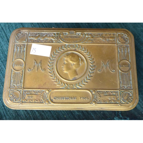 75 - A mixed lot: to include a Great War period brass Christmas tin; and a vintage telephone 