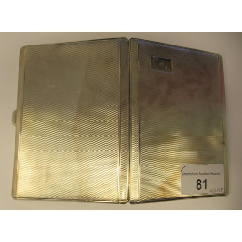 81 - A silver folding, engine turned cigarette case, on a button clasp  Birmingham 1939