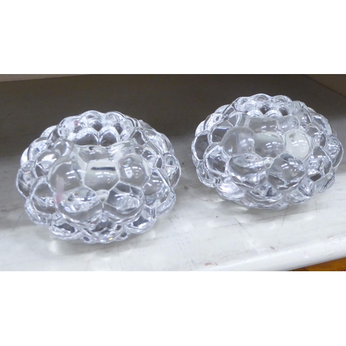 85 - A pair of Orrefors clear crystal knobbly effect T-light holders  4.25