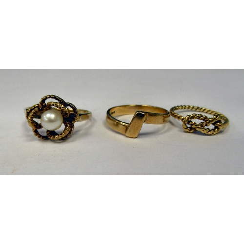 9 - Three 9ct gold rings: to include one set with a seed pearl 