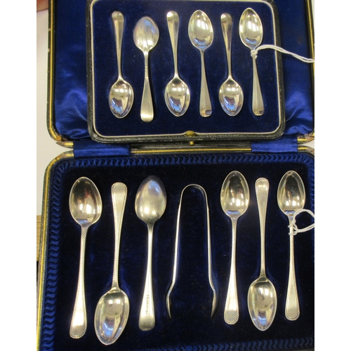 91 - A set of six silver Hanoverian rattail pattern coffee spoons  cased; and a set of six silver teaspoo... 