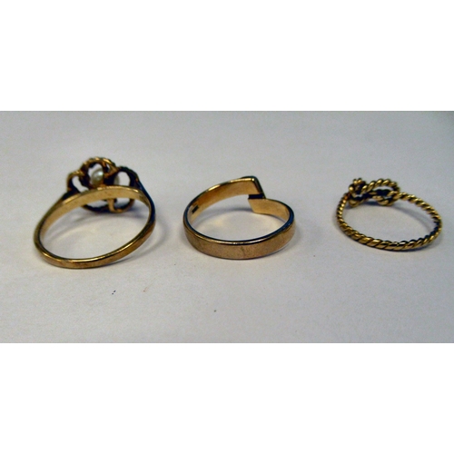 9 - Three 9ct gold rings: to include one set with a seed pearl 