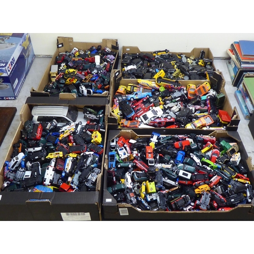 97 - Five boxes of diecast model vehicles: to include black cabs and sports cars with examples by Corgi a... 