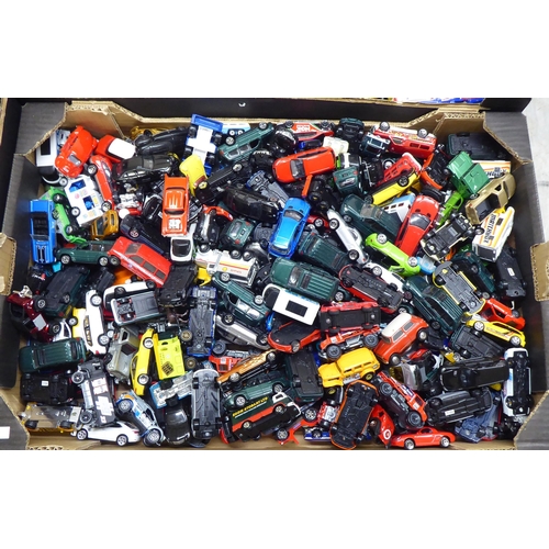 97 - Five boxes of diecast model vehicles: to include black cabs and sports cars with examples by Corgi a... 