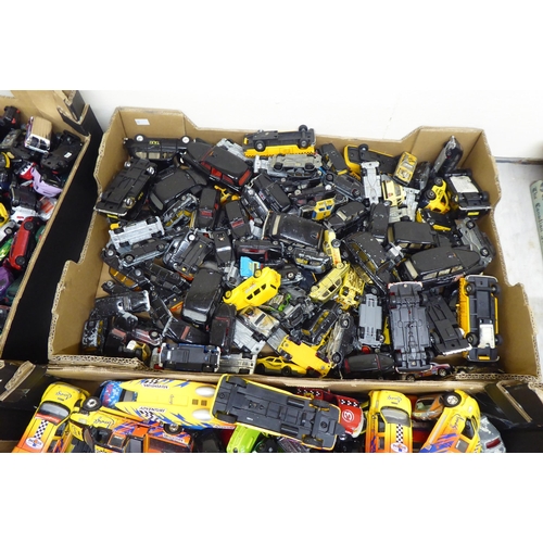 97 - Five boxes of diecast model vehicles: to include black cabs and sports cars with examples by Corgi a... 