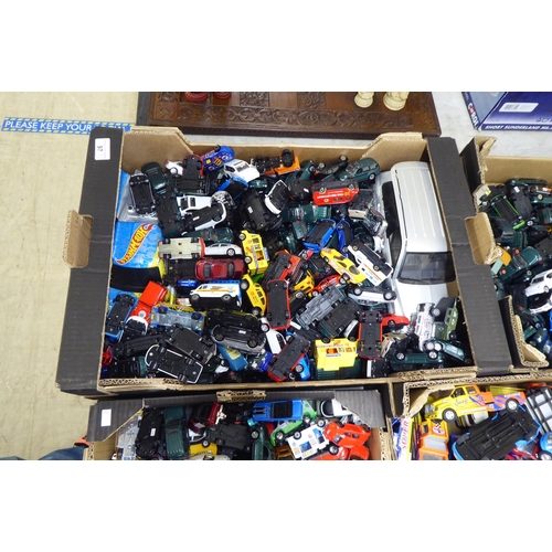 97 - Five boxes of diecast model vehicles: to include black cabs and sports cars with examples by Corgi a... 