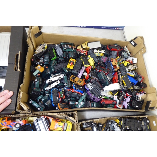 97 - Five boxes of diecast model vehicles: to include black cabs and sports cars with examples by Corgi a... 