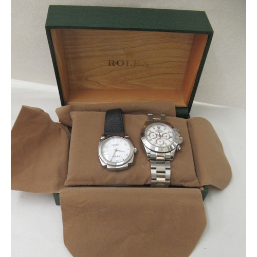 110 - Two stainless steel cased wristwatches, one with a strap 