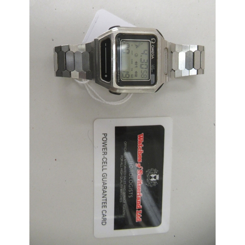 127 - An Omega Sensor stainless steel cased and strapped wristwatch with digital display  boxed with ... 